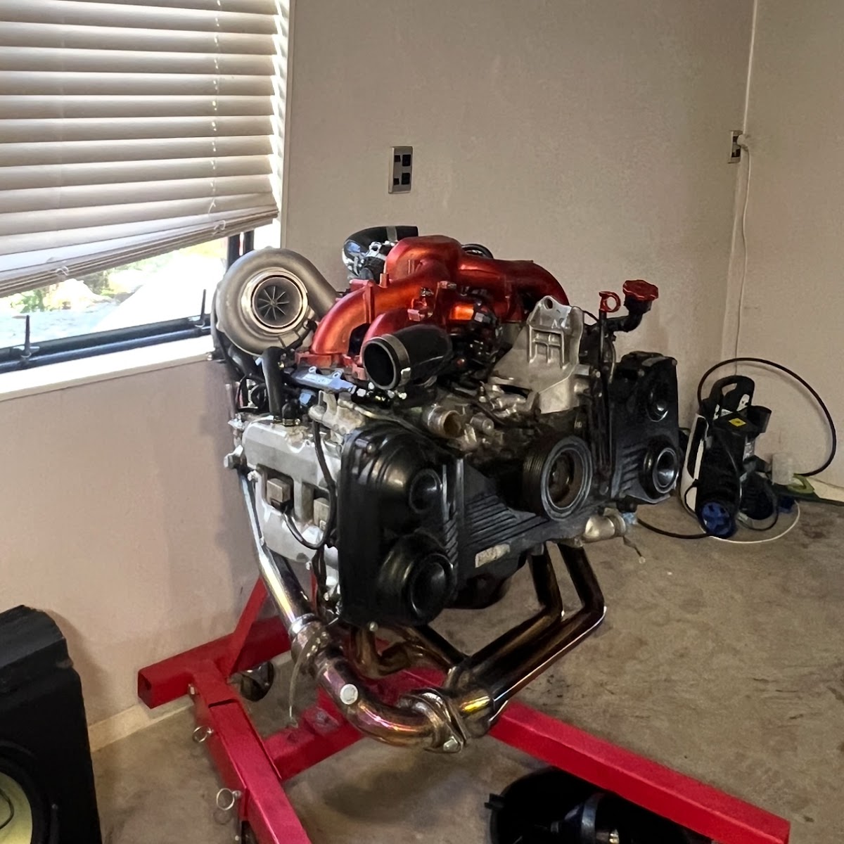Turbo engine build with candy red manifold